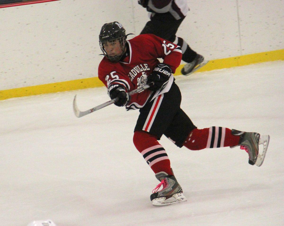 Luke Triola speeding across the ice (contributed photo).
