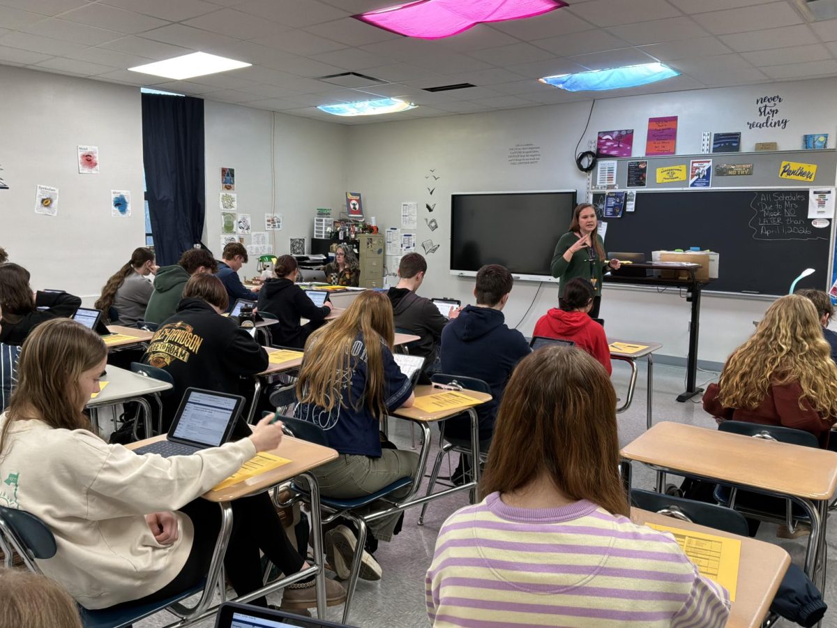 Mrs. Mook's fifth-period students prepare for scheduling.